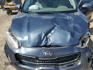 2017 Kia Sportage LX z VIN KNDPMCAC9H7195919, wystawiony jako Copart lot #55166435 z przebiegiem 116 678 mil mil oraz Czysty tytuł • Clean title. Historia ofert i sprzedaży dostępna na DreamBid. Obrazek 12.