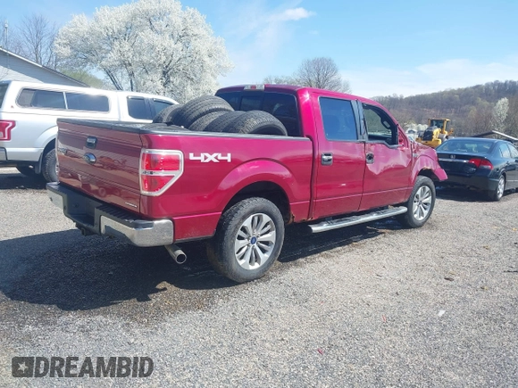 2014 Ford F-150 XL with VIN 1FTFW1EF8EFB27918, listed as a IAAI auction lot 41938587 with 129,508 mi miles. Bid and sale history available at carsss.com. Image 4.