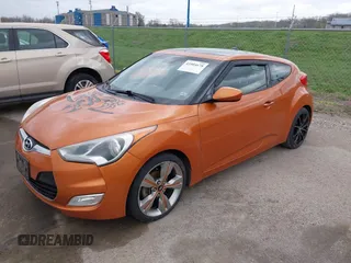 2013 Hyundai Veloster RE:MIX with VIN KMHTC6AD5DU106088, listed as a IAAI auction lot 41904678 with 213,478 mi miles and . Bid and sale history available at DreamBid. Image 2.