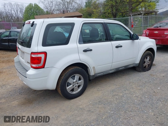 2009 Ford Escape XLS with VIN 1FMCU927X9KC79986, listed as a IAAI auction lot 41936917 with 208,816 mi miles and . Bid and sale history available at DreamBid. Image 4.