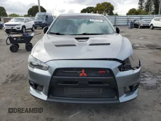 2014 Mitsubishi Lancer Evolution MR with VIN JA32W5FVXEU007527, listed as a Copart auction lot 87667745 with 74,484 mi miles and Salvage Title. Bid and sale history available at carsss.com. Image 5.