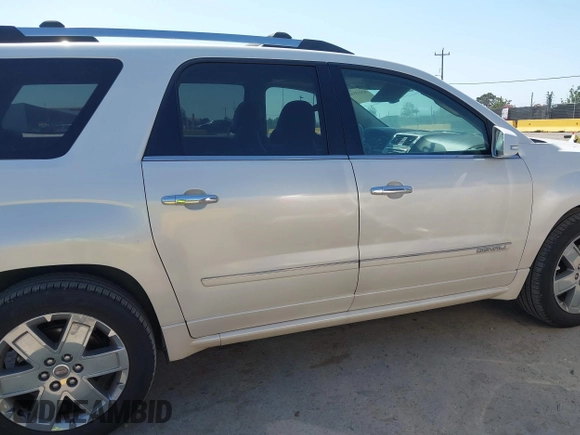 2013 GMC Acadia Denali z VIN 1GKKVTKD2DJ171476, wystawiony jako IAAI lot #42453510 z przebiegiem 129 787 mil mil oraz . Historia ofert i sprzedaży dostępna na DreamBid. Obrazek 13.