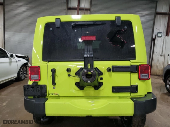 2016 Jeep Wrangler Unlimited 75th Anniversary with VIN 1C4BJWEG4GL290038, listed as a Copart auction lot 49796915 with 102,743 mi miles and Salvage Title. Bid and sale history available at carsss.com. Image 6.