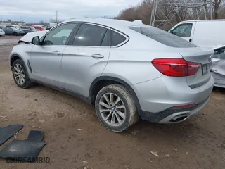 2018 BMW X6 xDrive35i with VIN 5UXKU2C50J0X49445, listed as a IAAI auction lot 41449077 with 130,912 mi miles. Bid and sale history available at carsss.com. Image 3.