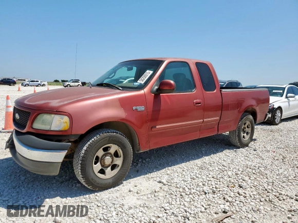 2002 Ford F-150 XL with VIN 1FTRX17202NA40522, listed as a Copart auction lot 58208915 with 100,297 mi miles and Salvage title. Bid and sale history available at DreamBid. Image 1.