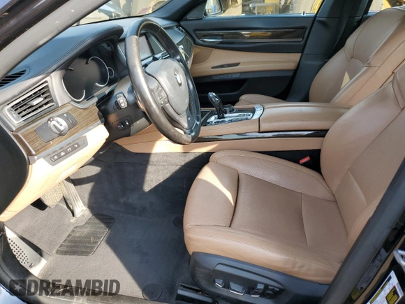 2015 BMW 7 Series 750i xDrive with VIN WBAYB6C53FD966042, listed as a Copart auction lot 69387464 with 64,977 mi miles and Salvage Title. Bid and sale history available at carsss.com. Image 7.