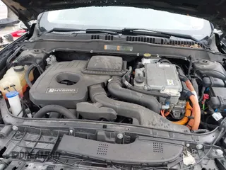 2019 Ford Fusion Hybrid SEL with VIN 3FA6P0MU1KR202860, listed as a IAAI auction lot 41983299 with 133,671 mi miles. Bid and sale history available at carsss.com. Image 10.