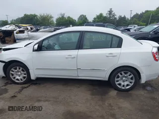 2012 Nissan Sentra S z VIN 3N1AB6APXCL636612, wystawiony jako IAAI lot #42610932 z przebiegiem 150 605 mil mil oraz . Historia ofert i sprzedaży dostępna na DreamBid. Obrazek 14.