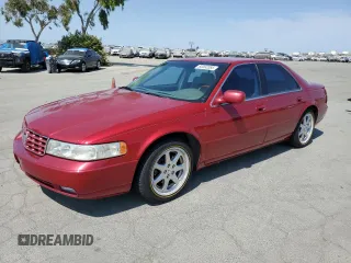 1999 Cadillac Seville STS z VIN 1G6KY5496XU902455, wystawiony jako Copart lot #60092085 z przebiegiem 133 314 mil mil oraz Szkoda całkowita • Salvage title. Historia ofert i sprzedaży dostępna na DreamBid. Obrazek 1.