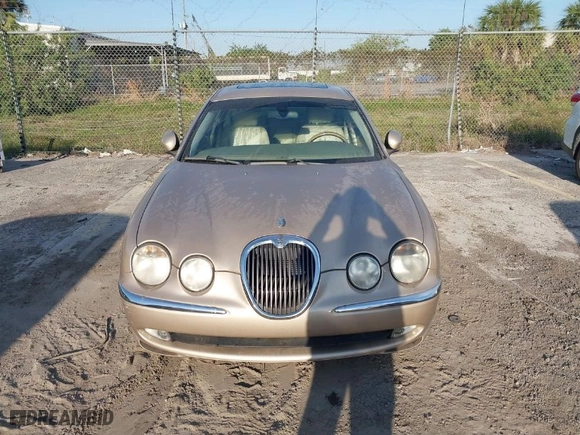 2003 Jaguar S-Type with VIN SAJEA01T23FM83652, listed as a IAAI auction lot 41790868 with NaN miles. Bid and sale history available at carsss.com. Image 6.