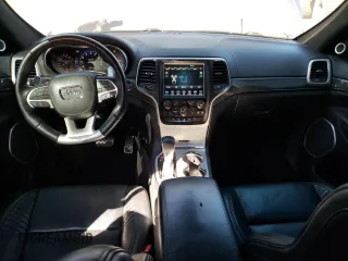 2018 Jeep Grand Cherokee with VIN NJ1454E, listed as a Copart auction lot 48051693 with 66,894 mi miles and Salvage title. Bid and sale history available at DreamBid. Image 8.