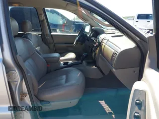 2002 Jeep Grand Cherokee Laredo with VIN 1J4GX48S52C249574, listed as a IAAI auction lot 42458883 with 89,028 mi miles and . Bid and sale history available at DreamBid. Image 5.
