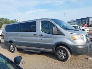 2018 Ford Transit Passenger XL with VIN 1FBZX2YM0JKA70128, listed as a IAAI auction lot 42379000 with 125,309 mi miles and . Bid and sale history available at DreamBid. Image 13.