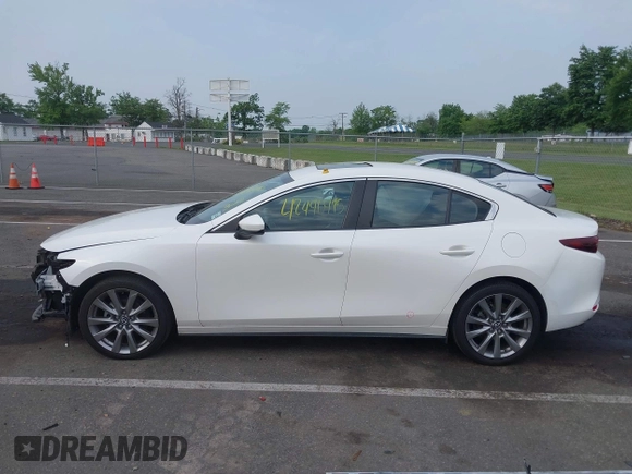 2021 Mazda 3 Preferred with VIN JM1BPACL4M1311415, listed as a IAAI auction lot 42490995 with 38,015 mi miles and . Bid and sale history available at DreamBid. Image 14.