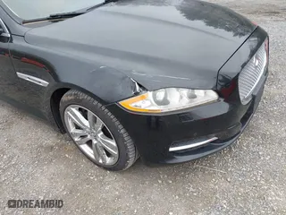 2012 Jaguar XJ with VIN SAJWA2GBXCLV32998, listed as a IAAI auction lot 41954979 with 1 mi miles. Bid and sale history available at carsss.com. Image 6.