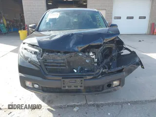 2020 Honda Ridgeline RTL with VIN 5FPYK3F59LB023212, listed as a IAAI auction lot 40704228 with 73,259 mi miles and . Bid and sale history available at DreamBid. Image 6.