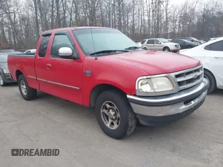 1998 Ford F-150 with VIN 1FTZX17WXWNC05002, listed as a IAAI auction lot 41799463 with 157,453 mi miles and . Bid and sale history available at DreamBid. Image 1.
