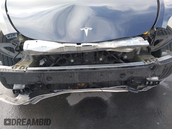 2021 Tesla Model Y Long Range with VIN 5YJYGAEE0MF223140, listed as a IAAI auction lot 42007701 with 55,308 mi miles. Bid and sale history available at carsss.com. Image 6.