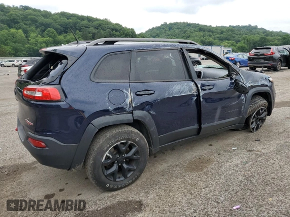2015 Jeep Cherokee Trailhawk with VIN 1C4PJMBB8FW740452, listed as a Copart auction lot 63023715 with 96,236 mi miles and Salvage title. Bid and sale history available at DreamBid. Image 3.