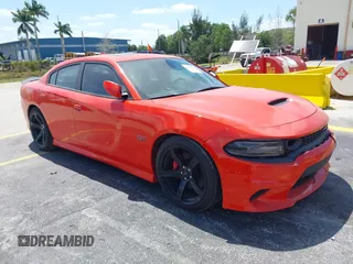 2020 Dodge Charger Scat Pack z VIN 2C3CDXGJ6LH197320, wystawiony jako IAAI lot #42158001 z przebiegiem 27 912 mil mil oraz . Historia ofert i sprzedaży dostępna na DreamBid. Obrazek 1.