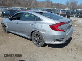 2021 Honda Civic Sport with VIN 2HGFC2F83MH540939, listed as a IAAI auction lot 41789508 with 100,274 mi miles and . Bid and sale history available at DreamBid. Image 3.