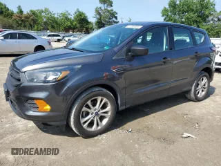 2018 Ford Escape S with VIN 1FMCU0F73JUA28130, listed as a Copart auction lot 61298595 with 69,913 mi miles and Salvage title. Bid and sale history available at DreamBid. Image 1.