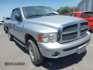 2002 Dodge 1500 z VIN 3D7HU18NX2G157441, wystawiony jako IAAI lot #42317729 z przebiegiem 216 874 mil mil oraz . Historia ofert i sprzedaży dostępna na DreamBid. Obrazek 1.