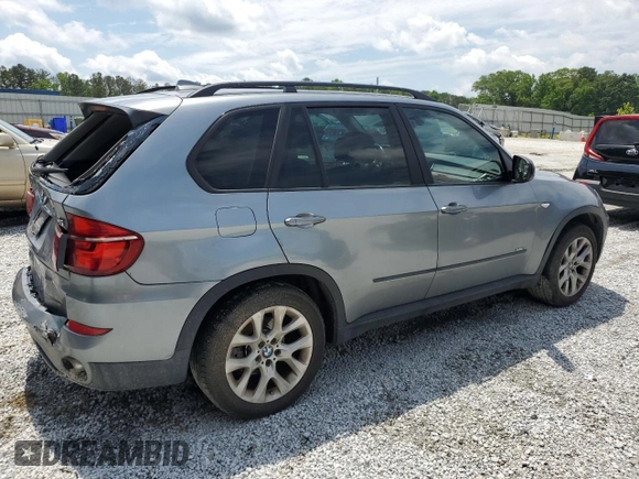 2012 BMW X5 35i with VIN 5UXZV4C50CL991452, listed as a Copart auction lot 56890265 with 147,019 mi miles and Salvage title. Bid and sale history available at DreamBid. Image 3.