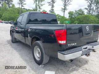 2010 Nissan Titan SE with VIN 1N6BA0CH7AN313538, listed as a IAAI auction lot 42179216 with 207,233 mi miles. Bid and sale history available at carsss.com. Image 3.