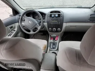 2009 Kia Spectra EX with VIN KNAFE222795620282, listed as a Copart auction lot 53187425 with 0 mi miles and Salvage Title. Bid and sale history available at carsss.com. Image 8.