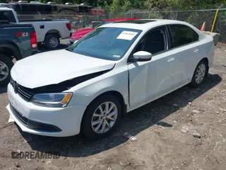 2014 Volkswagen Jetta SE with VIN 3VWD17AJ5EM437072, listed as a IAAI auction lot 42463048 with 99,030 mi miles and . Bid and sale history available at DreamBid. Image 2.