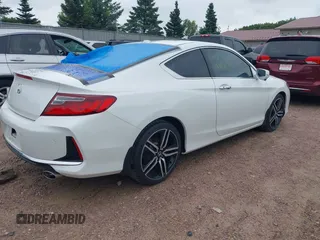 2016 Honda Accord Touring with VIN 1HGCT2B09GA007614, listed as a IAAI auction lot 42532621 with 200,935 mi miles and . Bid and sale history available at DreamBid. Image 4.