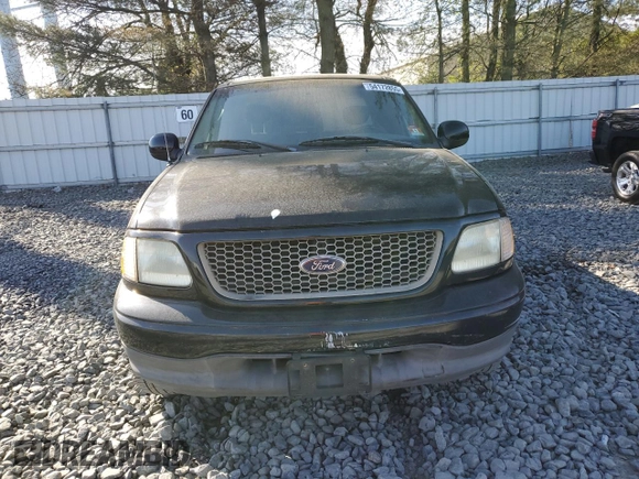 2002 Ford F-150 XL with VIN 1FTRX17L42NB06983, listed as a Copart auction lot 54172855 with 150,243 mi miles and Salvage title. Bid and sale history available at DreamBid. Image 5.