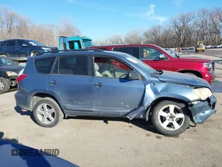 2006 Toyota RAV4 with VIN JTMBD33V565031424, listed as a IAAI auction lot 41457049 with 207,715 mi miles. Bid and sale history available at carsss.com. Image 13.