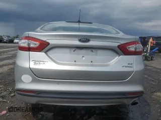 2013 Ford Fusion SE Hybrid с VIN 3FA6P0LU8DR240784, выставлен на аукционе Copart как лот 60202425 с пробегом 159 284 миль миль и Списание • Salvage title. История ставок и продаж доступна на DreamBid. Изображение 6.