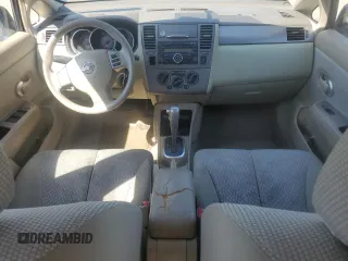2007 Nissan Versa 1.8 SL with VIN 3N1BC11E27L432802, listed as a Copart auction lot 71018594 with 118,795 mi miles and Salvage Title. Bid and sale history available at carsss.com. Image 8.