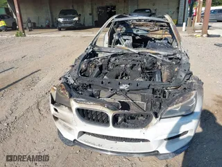 2016 BMW M6 with VIN WBS6J9C52GD934529, listed as a IAAI auction lot 40177964 with 51,664 mi miles. Bid and sale history available at carsss.com. Image 6.