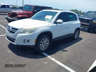 2010 Volkswagen Tiguan with VIN WVGAV9AX0AW510512, listed as a IAAI auction lot 42532527 with 193,910 mi miles and . Bid and sale history available at DreamBid. Image 2.