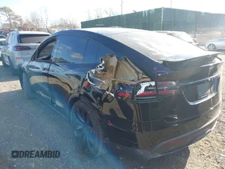 2023 Tesla Model X with VIN 7SAXCAE59PF377408, listed as a IAAI auction lot 41176738 with 32,496 mi miles and . Bid and sale history available at DreamBid. Image 3.