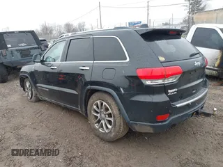 2014 Jeep Grand Cherokee Limited with VIN 1C4RJFBG2EC279944, listed as a IAAI auction lot 41591623 with 150,588 mi miles and . Bid and sale history available at DreamBid. Image 3.