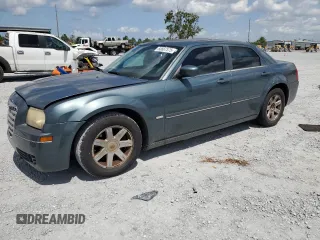 2005 Chrysler 300 Touring z VIN 2C3JA53G95H546536, wystawiony jako Copart lot #60667575 z przebiegiem 163 625 mil mil oraz Szkoda całkowita • Salvage title. Historia ofert i sprzedaży dostępna na DreamBid. Obrazek 1.