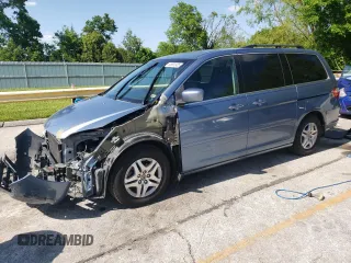 2006 Honda Odyssey Touring z VIN 5FNRL388X6B009356, wystawiony jako Copart lot #55991335 z przebiegiem 101 816 mil mil oraz Szkoda całkowita • Salvage title. Historia ofert i sprzedaży dostępna na DreamBid. Obrazek 1.
