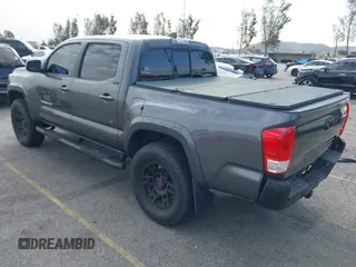 2017 Toyota Tacoma SR5 with VIN 3TMAZ5CN7HM036078, listed as a IAAI auction lot 41698163 with 91,376 mi miles. Bid and sale history available at carsss.com. Image 3.