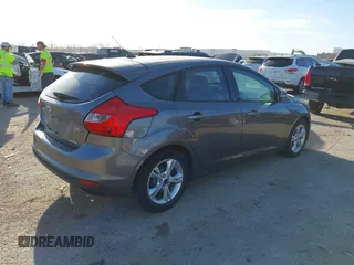 2013 Ford Focus SE with VIN 1FADP3K29DL220311, listed as a IAAI auction lot 41790487 with 136,257 mi miles. Bid and sale history available at carsss.com. Image 4.