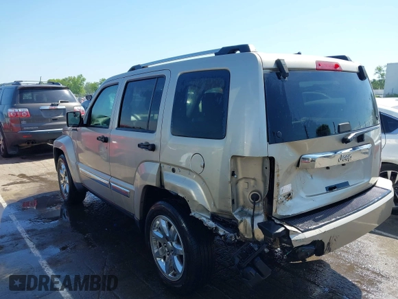2010 Jeep Liberty Limited z VIN 1J4PN5GK0AW112035, wystawiony jako IAAI lot #42145071 z przebiegiem 151 889 mil mil oraz . Historia ofert i sprzedaży dostępna na DreamBid. Obrazek 14.