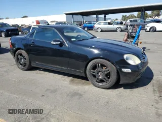 2001 Mercedes-Benz SLK-Class with VIN WDBKK65F71F175734, listed as a Copart auction lot 61874984 with 185,408 mi miles and Salvage Title. Bid and sale history available at carsss.com. Image 4.
