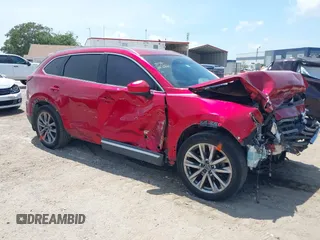 2019 Mazda CX-9 Grand Touring z VIN JM3TCADY5K0302436, wystawiony jako IAAI lot #42323545 z przebiegiem Nie podano mil oraz . Historia ofert i sprzedaży dostępna na DreamBid. Obrazek 1.
