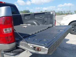 2013 Chevrolet Silverado 1500 LT with VIN 3GCPCSE01DG206827, listed as a IAAI auction lot 41976945 with 213,940 mi miles and . Bid and sale history available at DreamBid. Image 18.