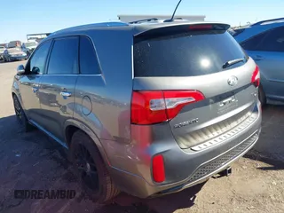 2014 Kia Sorento SX with VIN 5XYKW4A75EG457768, listed as a IAAI auction lot 41388412 with 129,691 mi miles. Bid and sale history available at carsss.com. Image 3.