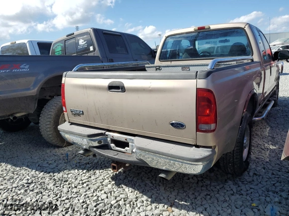 1999 Ford Super Duty F-250 XL with VIN 1FTNX20L8XEC12729, listed as a Copart auction lot 45023335 with 136,587 mi miles and Clean Title. Bid and sale history available at carsss.com. Image 4.